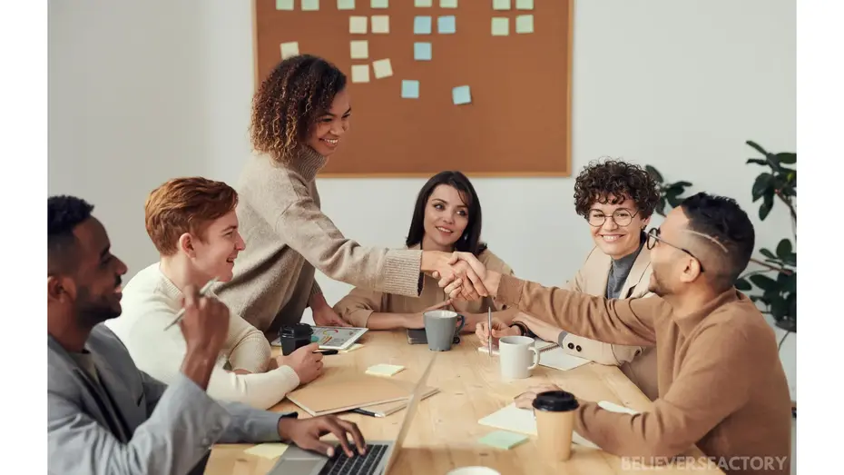 A diverse business team in a meeting, exchanging ideas., two people shaking hands. Fostering a positive and collaborative business environment.