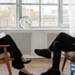 Man discussing personal challenges with therapist to become emotionally ready for meeting potential partners.